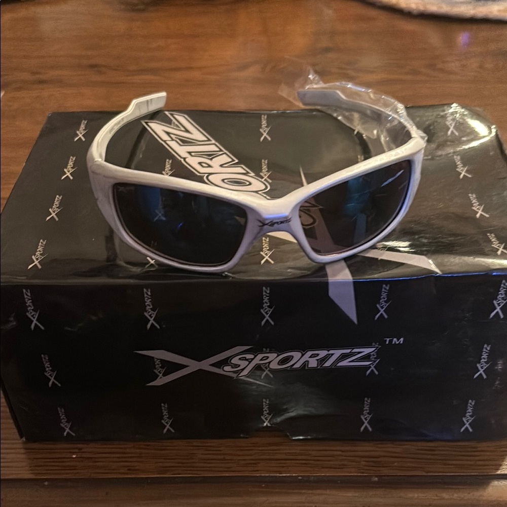 New in package XSportz gray uv400 sunglasses 😎 OS